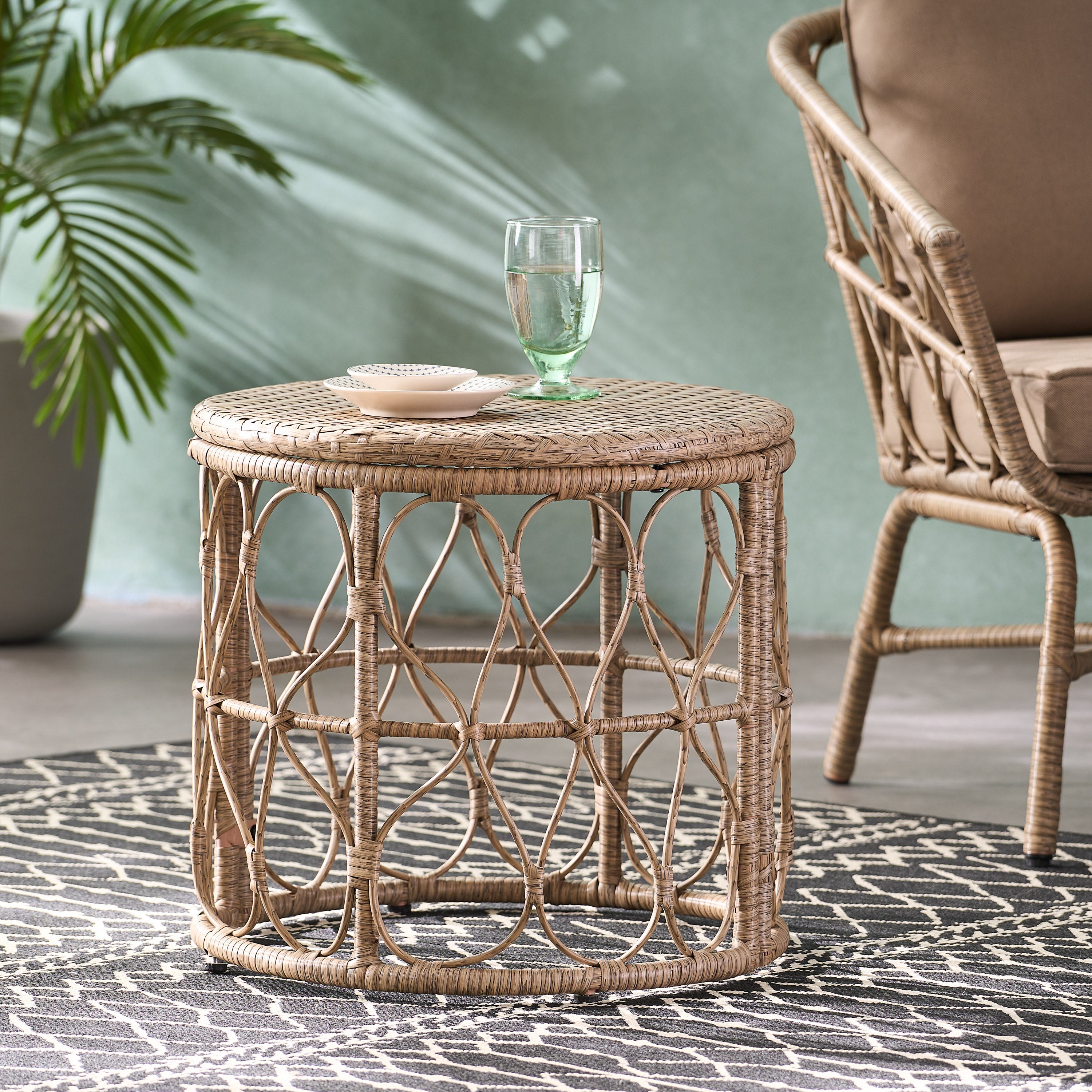 Cultured Outdoor Side Table with Wicker Weave Top and Looped Design