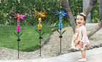 Bejeweled Metal Spinning Floral Solar Stake Light