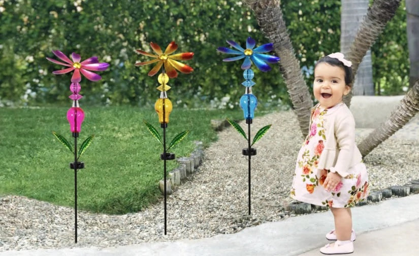 Bejeweled Metal Spinning Floral Solar Stake Light