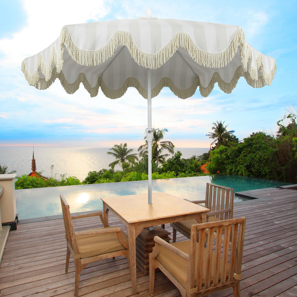 Collins 9 ft. Classic Cottage Fringe Tassel Market Patio Umbrella with Auto-Tilt Crank