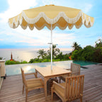 Collins 9 ft. Classic Cottage Fringe Tassel Market Patio Umbrella with Auto-Tilt Crank